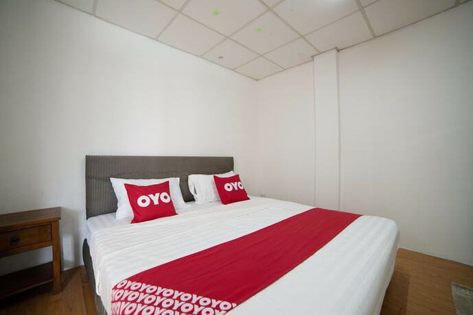 Imagen de la habitación del Hotel Oyo 457 Panasan Villa. Foto 17