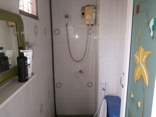 Imagen de la habitación del Hotel Oyo 471 Sunshine Apartment. Foto 2