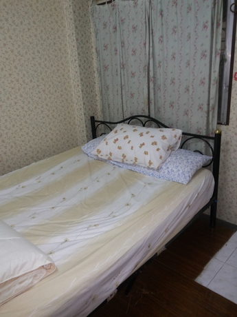 Imagen de la habitación del Hotel Oyo 471 Sunshine Apartment. Foto 3