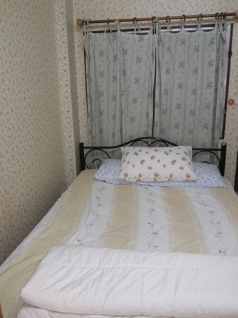 Imagen de la habitación del Hotel Oyo 471 Sunshine Apartment. Foto 4