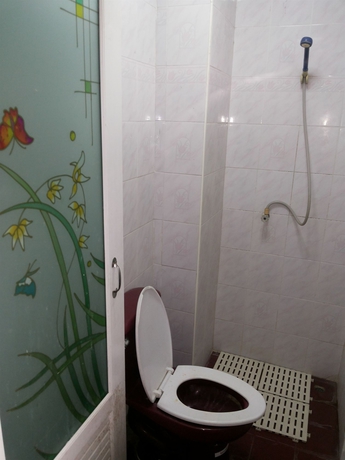 Imagen de la habitación del Hotel Oyo 471 Sunshine Apartment. Foto 13