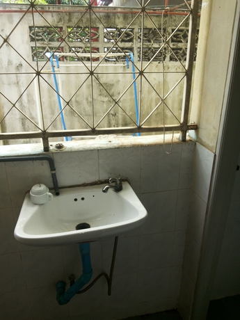 Imagen de la habitación del Hotel Oyo 471 Sunshine Apartment. Foto 14