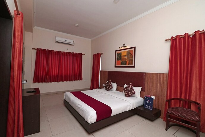 Imagen de la habitación del Hotel Oyo 4754 Center Point. Foto 20