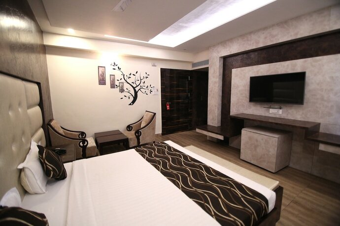 Imagen de la habitación del Hotel Oyo 4779 Vansh Palace. Foto 11