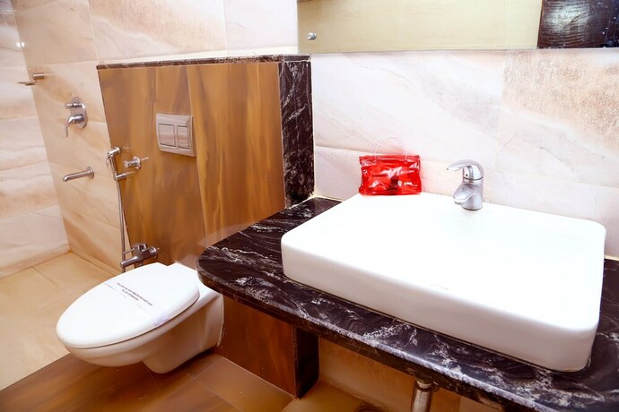 Imagen de la habitación del Hotel Oyo 4779 Vansh Palace. Foto 13