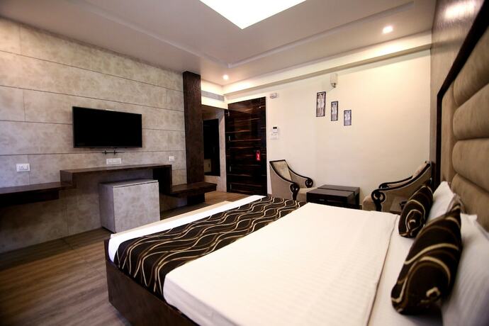 Imagen de la habitación del Hotel Oyo 4779 Vansh Palace. Foto 15