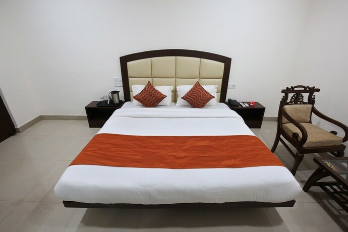 Imagen de la habitación del Hotel Oyo 4856 The Benz. Foto 10