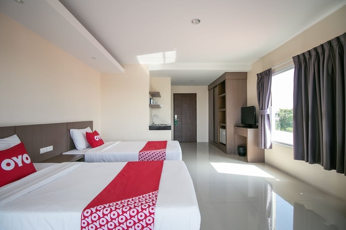 Imagen de la habitación del Hotel Oyo 488 Delight Residence. Foto 12