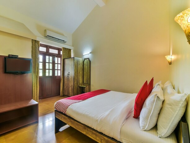 Imagen de la habitación del Hotel Oyo 4977 Kristal Sands Beach Resort. Foto 14