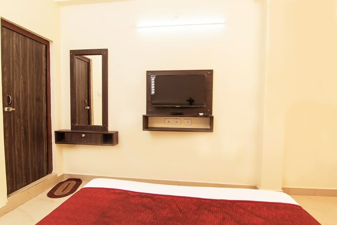 Imagen de la habitación del Hotel Oyo 4998 Sara Residency. Foto 27