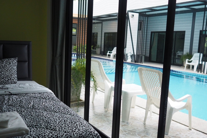 Imagen de la habitación del Hotel Oyo 500 Cordelia Resort Samroiyod. Foto 8