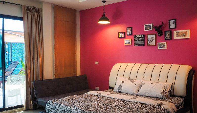 Imagen de la habitación del Hotel Oyo 500 Cordelia Resort Samroiyod. Foto 9