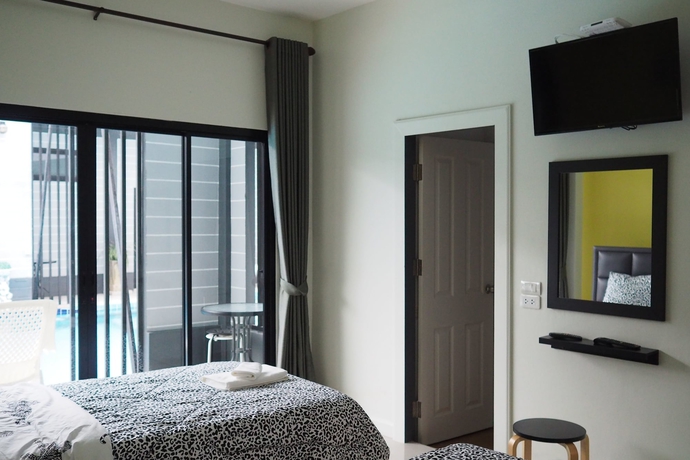 Imagen de la habitación del Hotel Oyo 500 Cordelia Resort Samroiyod. Foto 12