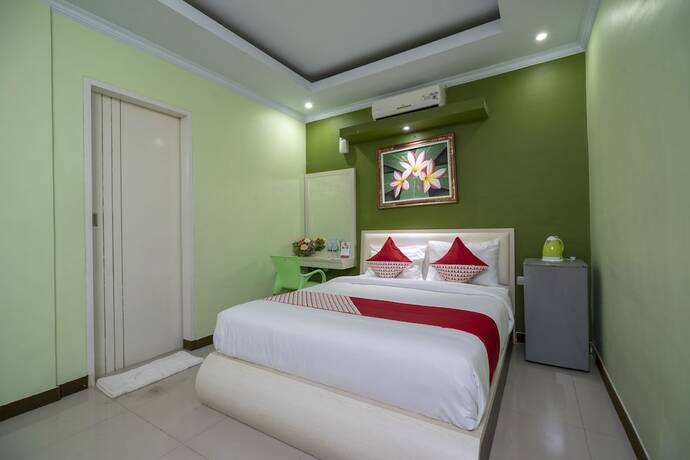 Imagen de la habitación del Hotel Oyo 523 Dedy Beach Inn. Foto 2