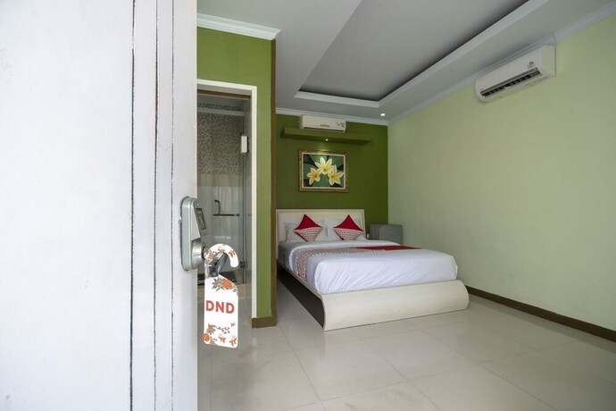 Imagen de la habitación del Hotel Oyo 523 Dedy Beach Inn. Foto 7