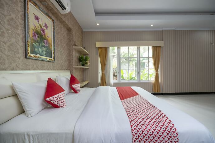 Imagen de la habitación del Hotel Oyo 523 Dedy Beach Inn. Foto 8