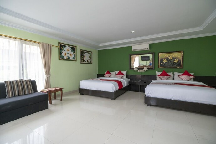 Imagen de la habitación del Hotel Oyo 523 Dedy Beach Inn. Foto 10