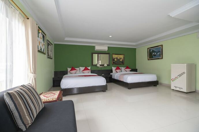 Imagen de la habitación del Hotel Oyo 523 Dedy Beach Inn. Foto 11