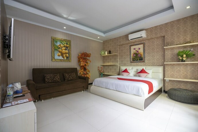Imagen de la habitación del Hotel Oyo 523 Dedy Beach Inn. Foto 13