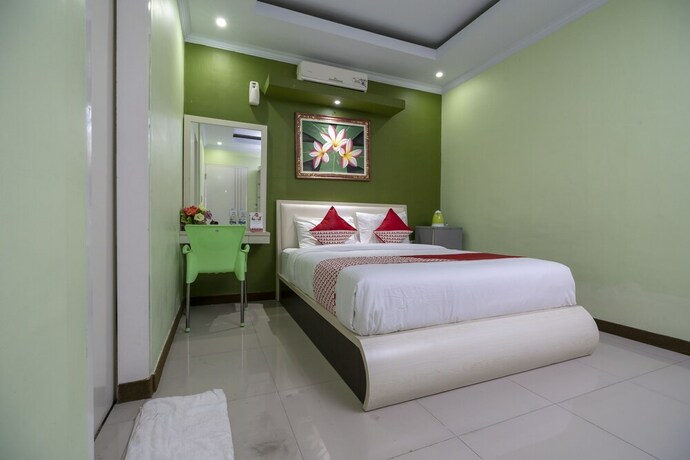 Imagen de la habitación del Hotel Oyo 523 Dedy Beach Inn. Foto 14