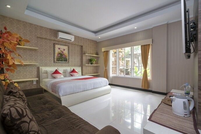 Imagen de la habitación del Hotel Oyo 523 Dedy Beach Inn. Foto 16