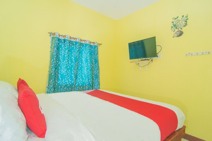 Imagen de la habitación del Hotel Oyo 527 Tanfa Resort. Foto 4