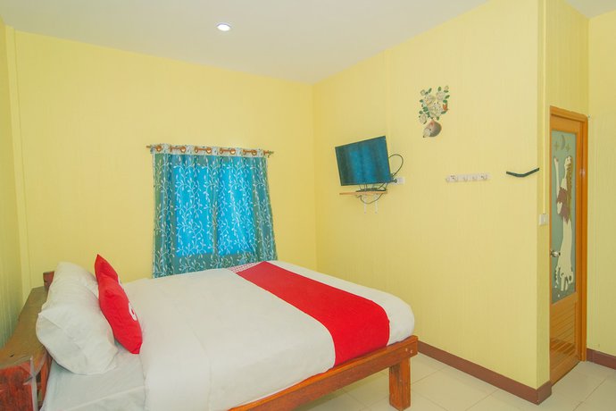 Imagen de la habitación del Hotel Oyo 527 Tanfa Resort. Foto 8