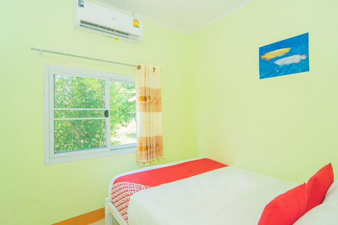 Imagen de la habitación del Hotel Oyo 527 Tanfa Resort. Foto 9