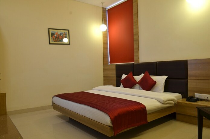 Imagen de la habitación del Hotel Oyo 5389 Polo Club. Foto 7