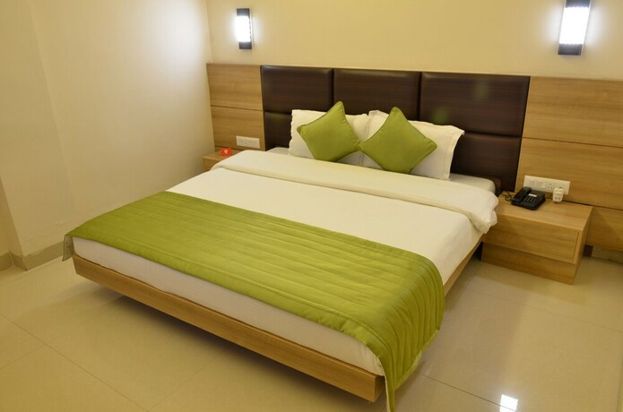 Imagen de la habitación del Hotel Oyo 5389 Polo Club. Foto 10