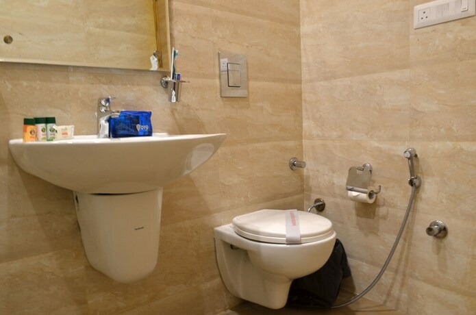 Imagen de la habitación del Hotel Oyo 5389 Polo Club. Foto 13