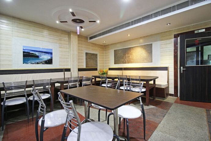 Imagen del bar/restaurante del Hotel Oyo 5539 Merit. Foto 4