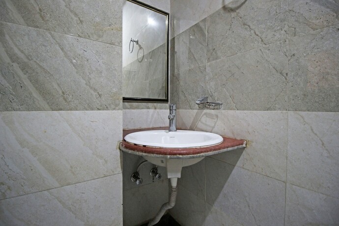 Imagen de la habitación del Hotel Oyo 5539 Merit. Foto 9
