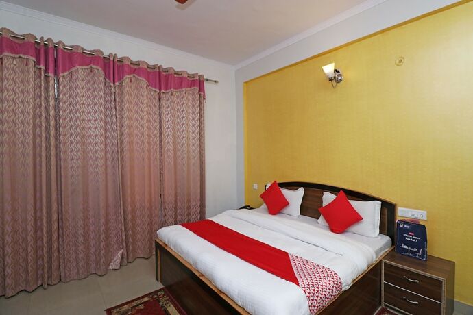 Imagen de la habitación del Hotel Oyo 5589 Pine Oak Resort. Foto 2