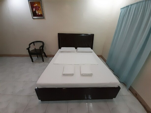 Imagen de la habitación del Hotel Oyo 565 Hillside Resort. Foto 5