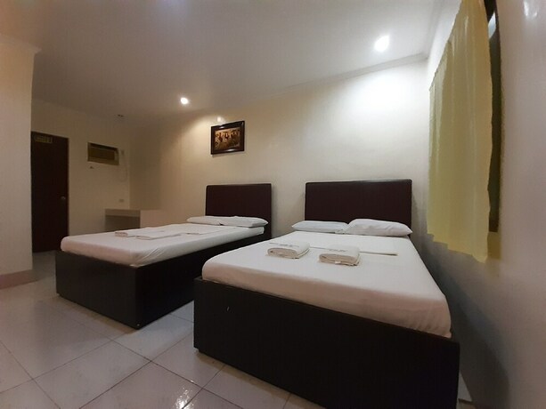 Imagen de la habitación del Hotel Oyo 565 Hillside Resort. Foto 6