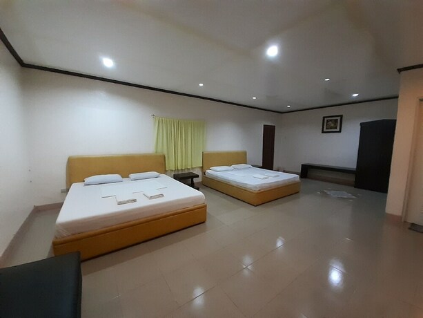 Imagen de la habitación del Hotel Oyo 565 Hillside Resort. Foto 8