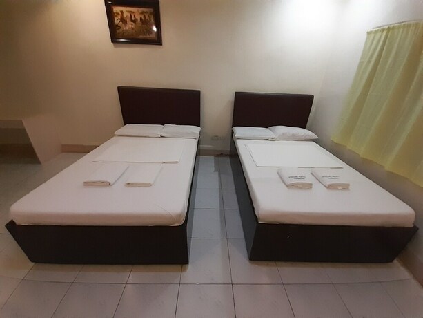 Imagen de la habitación del Hotel Oyo 565 Hillside Resort. Foto 12