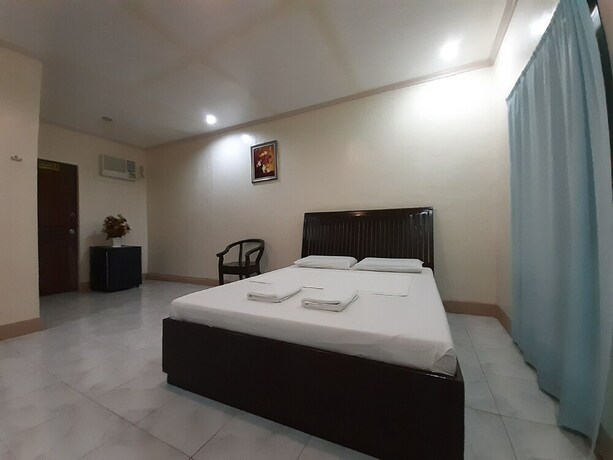 Imagen de la habitación del Hotel Oyo 565 Hillside Resort. Foto 13