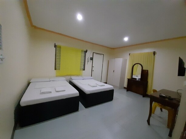 Imagen de la habitación del Hotel Oyo 565 Hillside Resort. Foto 18