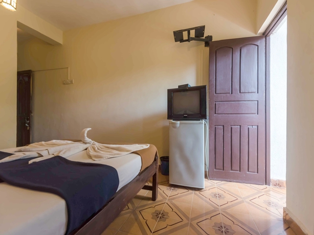 Imagen de la habitación del Hotel Oyo 5651 Stayout Near Baga Beach. Foto 4