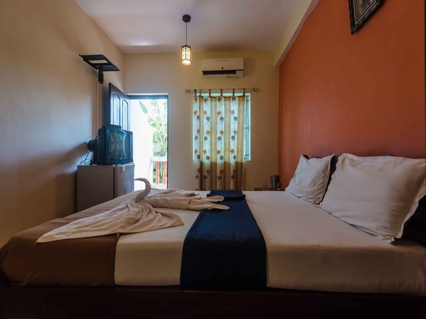 Imagen de la habitación del Hotel Oyo 5651 Stayout Near Baga Beach. Foto 6