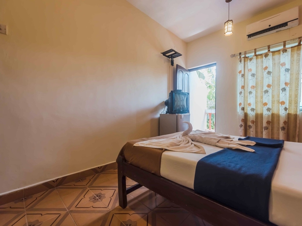 Imagen de la habitación del Hotel Oyo 5651 Stayout Near Baga Beach. Foto 8