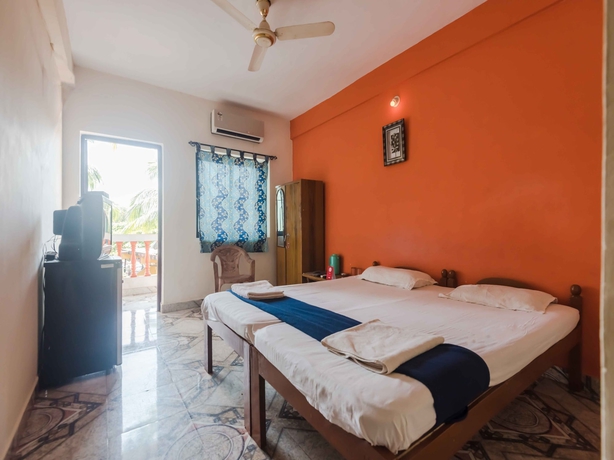Imagen de la habitación del Hotel Oyo 5651 Stayout Near Baga Beach. Foto 11