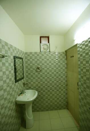 Imagen de la habitación del Hotel Oyo 5688 Gagan Eco. Foto 8