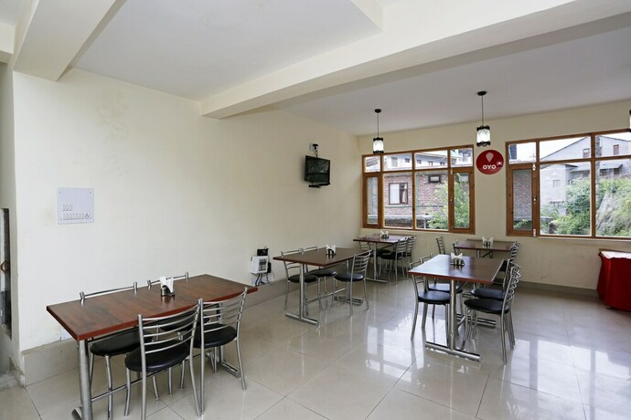 Imagen del bar/restaurante del Hotel Oyo 5698 The Destination Manali. Foto 21