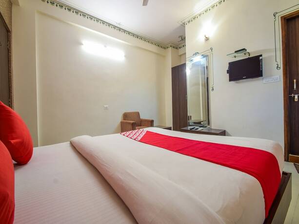 Imagen de la habitación del Hotel Oyo 5715 King Mansion. Foto 3