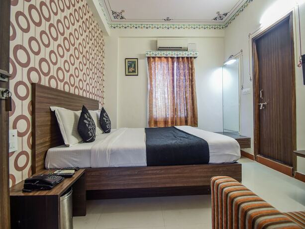 Imagen de la habitación del Hotel Oyo 5715 King Mansion. Foto 13