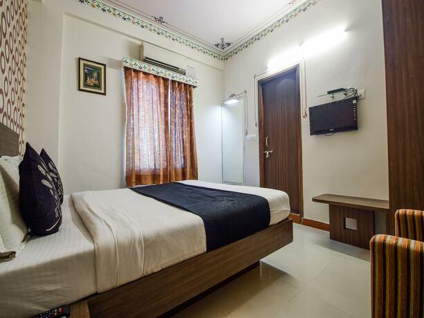 Imagen de la habitación del Hotel Oyo 5715 King Mansion. Foto 15