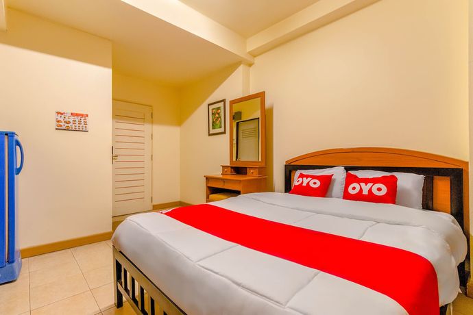 Imagen de la habitación del Hotel Oyo 583 Sweethome Guest House. Foto 2